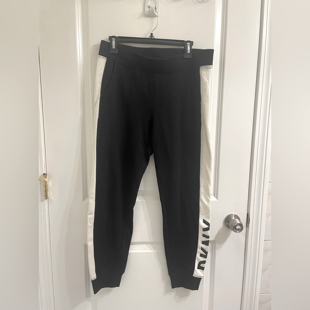 USED DKNY Black Sport White stripped Size Medium pockets Logo Drawstring Side